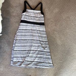 Athletic blacks and white dress.